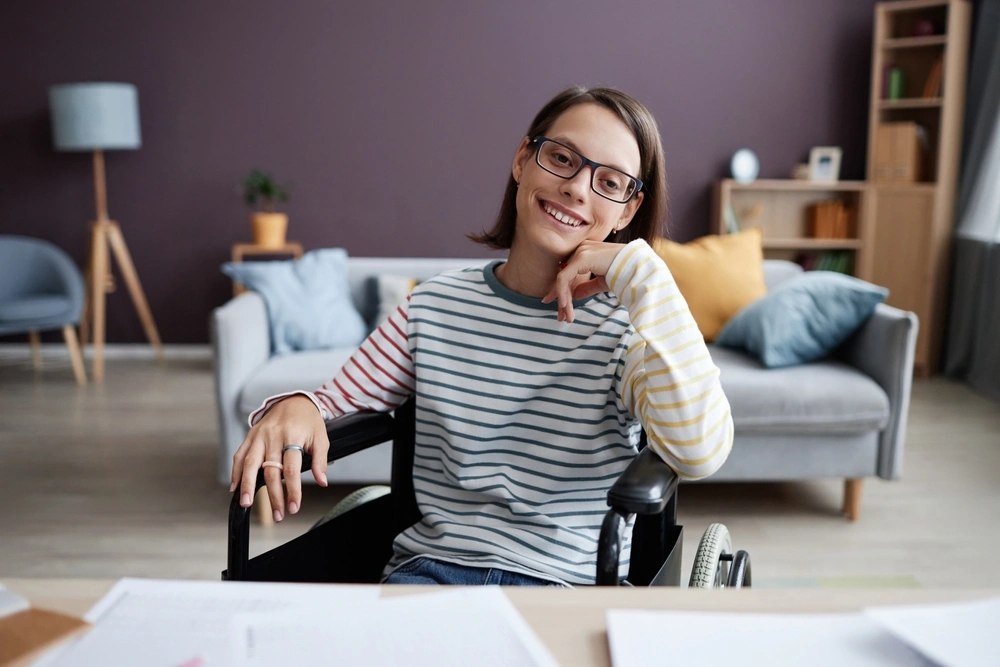 disabled women on wheelchair in her home, smiling